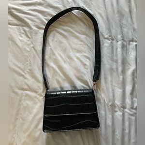 Black faux crocodile skin print mini purse.